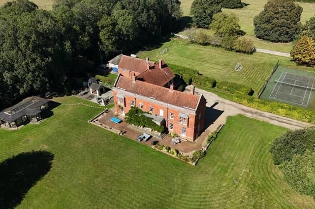 An aerial view of the property and its grounds.