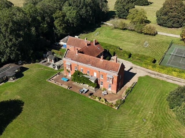 An aerial view of the property and its grounds.