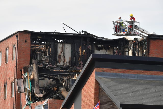 The scene on Wednesday morning as the fire service inspected the site.