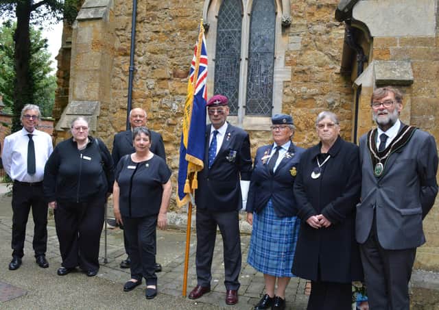 Market Rasen Councillors and the Royal British Legion standard bearer outside the church