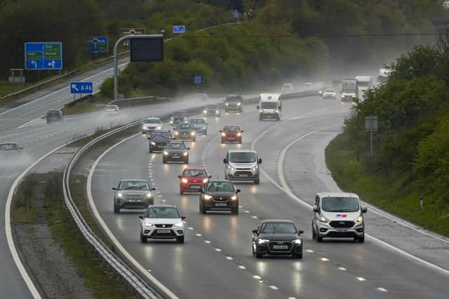 Vehicles travel along the M4 motorway near Bath on Bank Holiday Monday, as strong winds are expected to sweep eastwards across Wales and the south of England from midday on Monday to 9am on Tuesday. Picture date: Monday May 3, 2021.