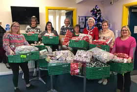 Coningsby Coop Food Store staff with their collected presents.