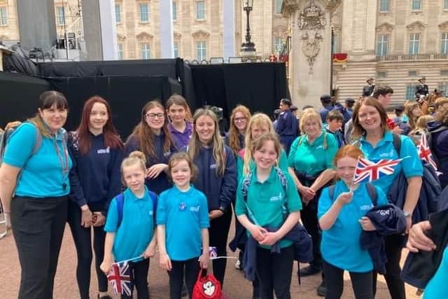 Sleaford Girls Brigade leaders and members outside Buckingham Palace after watching the Trooping the Colour event.
