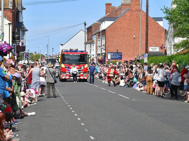 The crowd lines the High Street awaiting the parade.