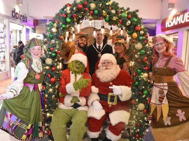 Mayor of Skegness Coun Adrian Findley with the Neverland elves and Santa at the Hildreds Centre.