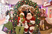 Mayor of Skegness Coun Adrian Findley with the Neverland elves and Santa at the Hildreds Centre.