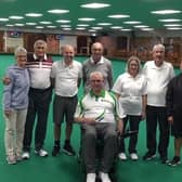 The winners and losing finalists of Boston Indoor Bowls Club's Open 3-Wood Drawn Triples competition, with the organisers, Carol Dowse (extreme left) and Mark Brown (extreme right)