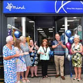 Mayor Coun Julia Simmons (centre) opens the new Mind shop with regional manager Keven Willows (third right). Photo: Mick Fox