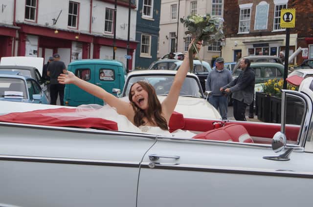 Holly Cook, from Bridal Reloved at Caistor, modelled an Alan Hannah wedding dress in the 1959 Buick Invictor owned by Jon Gillman of Grasby