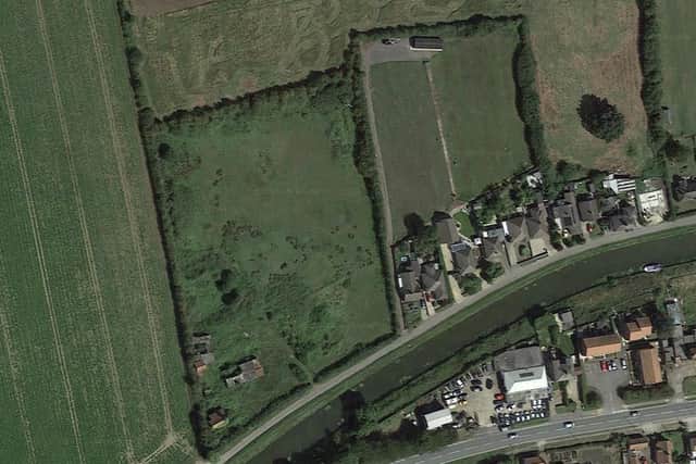 Plans to raise a plot of land in Saxilby have been approved despite community concerns
