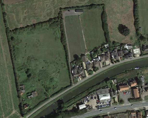 Plans to raise a plot of land in Saxilby have been approved despite community concerns