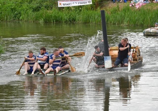 Competitors in the raft race give it their  oar-ll.