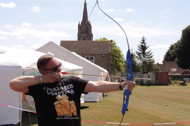 James Layton of East Heckington trying the have-a-go archery at the fun day.