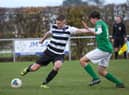 A rare sight in recent weeks - Louth Town in competitive action.