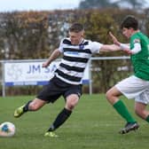 A rare sight in recent weeks - Louth Town in matchday action.