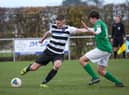 A rare sight in recent weeks - Louth Town in matchday action.