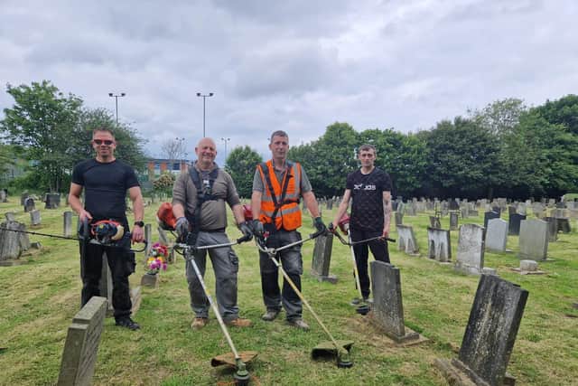 Mayor of Skegness Coun Adrian Findley (second right) with a team of volunteers in St Clement's Churchyard in Skegness.