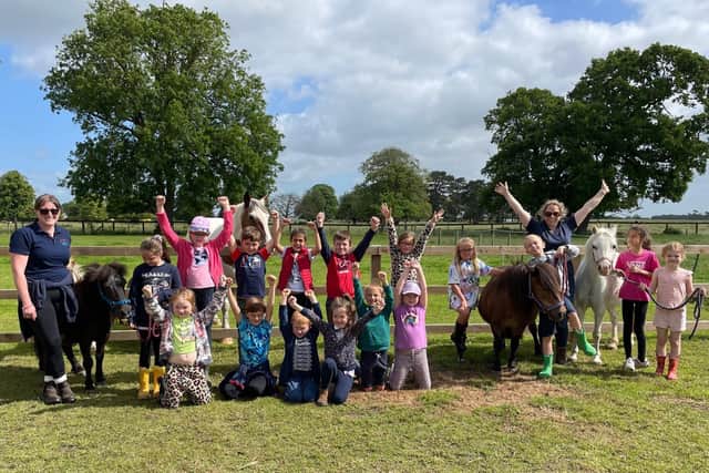 Pupils at St George's Prep School celebrate their award at their Farm School in Langrick.