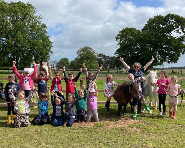 Pupils at St George's Prep School celebrate their award at their Farm School in Langrick.