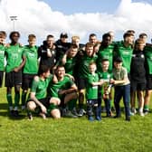 Sleaford Town celebrate their South Kesteven Charity Cup success. Photo: Steve W Davies Photography.