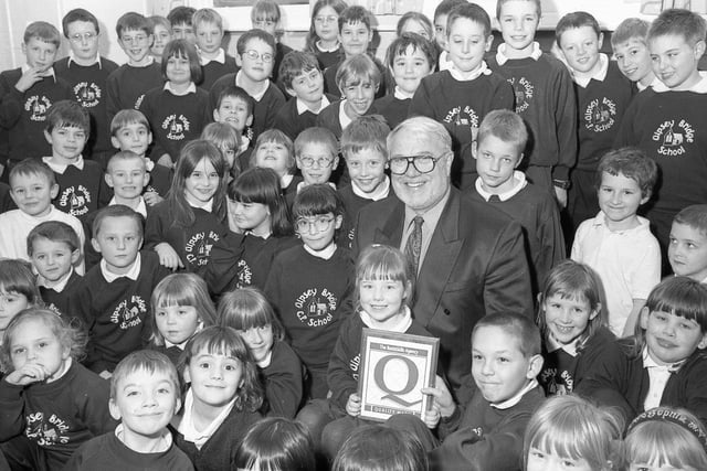 Gipsey Bridge Primary School celebrating after receiving the Basic Skills Award of Quality for English and maths skills. The award was presented to the youngest and eldest pupils, Hayleigh Garrett and Robert Arliss, by Lincolnshire director of education Norman Riches.