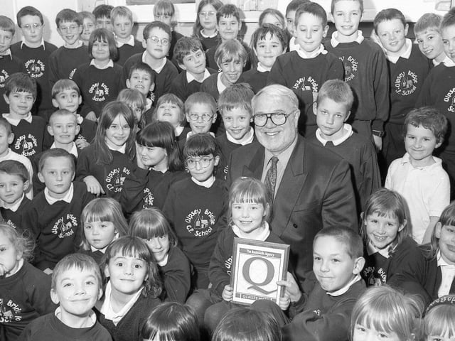 Gipsey Bridge Primary School celebrating after receiving the Basic Skills Award of Quality for English and maths skills. The award was presented to the youngest and eldest pupils, Hayleigh Garrett and Robert Arliss, by Lincolnshire director of education Norman Riches.
