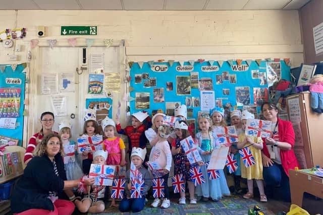 Children at Kirkby on Bain Nursery took part in a Royal one-mile Toddle all dressed up in Royal regalia and hand-made flags and crowns.