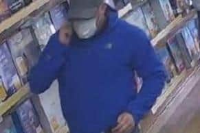 Wykes entering a travel agent in Skegness to purchase £4,000 in foreign currency using a stolen debit card.