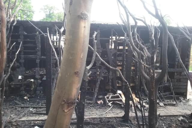 Fire damage caused to a large shed in a garden at Coningsby Close, Boston