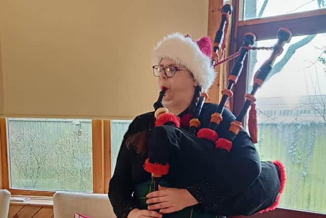 A piper entertains residents of Tanglewood Care Home in Horncastle to complete its Christmas celebrations.
