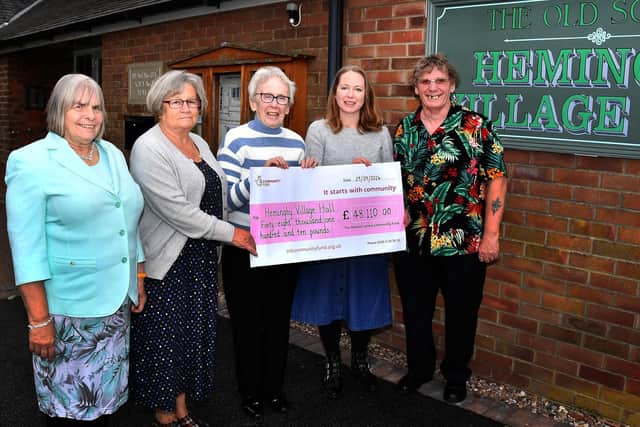 A cheque for £48,110 is presented by Emma Thyeor (second right), of the National Lottery Community Fund to representatives of Hemingby Village Hall. They are (from left) supporter Joy Rodwell, secretary Marie Newmarch, chair Josie Marshall and trustee Doug Rodwell. (PHOTO BY: Mick Fox)