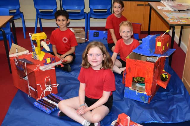 Pupils show off their scale models depicting Boston Docks.