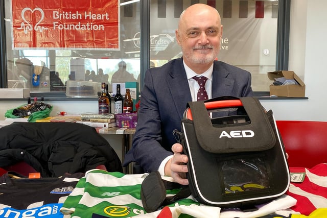 Tony Fenton with the portable defibrillator he has sponsored for the Wolds Wanderers