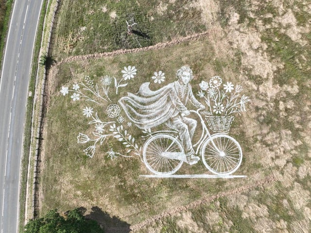 The famous Lincolnshire botanist and explorer, is shown on a bike with flowers spilling out of his back. Location: Revesby Estate, Field Side, Mareham le Fen, Boston, PE22 7QQ.