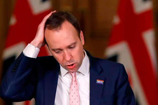 Britain's Health Secretary Matt Hancock attends a remote press conference to update the nation on the status of the Covid-19 pandemic, inside 10 Downing Street (Photo by KIRSTY WIGGLESWORTH/POOL/AFP via Getty Images)
