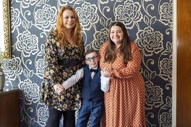 Tom Gardner pictured with his mum, left, and teacher, right.