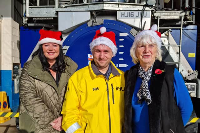 Jennifer Lowe, Head of Marketing of Skegness Rotary Club, Brad Johnson RNLI and Rotary President Pat Lowe.