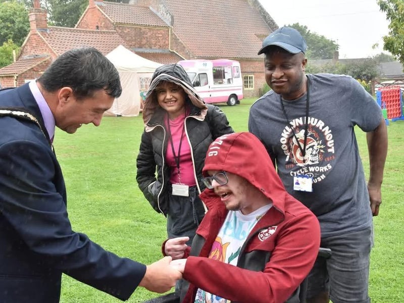 Thomas and Carers who traveled over 3 hours just to be at the Alice in Wonderfarm event meeting Cllr Jimmy Brookes the Mayor of Skegness