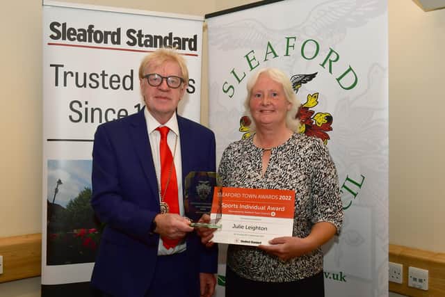 Julie Leighton of Sleaford Tennis Club, winner of the Sports Individual award, with Mayor's consort Paul Edwards-Shea.
