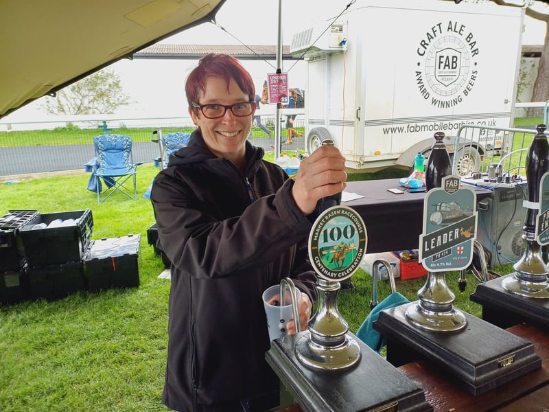 FAB Brewery's Lindsay Cussons prepares to pour a pint of their specially brewed Centenary Ale