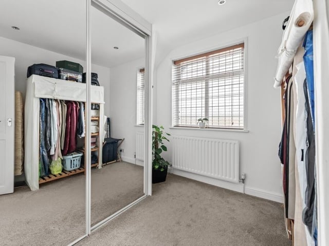 The fourth first-floor bedroom.