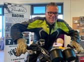Nigel Limb Recordbreaking Blind Motorcyclist on his Triumph Motocycle in Mablethorpe Library. Photo by Chris Frear