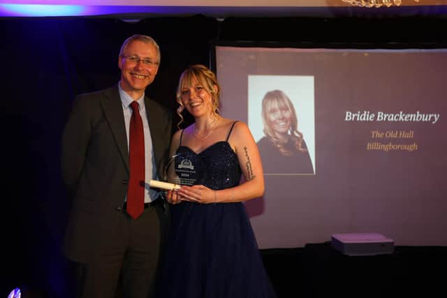 Bridie Brackenbury received the Residential Care Award last year from Martin Samuels, Executive Director of Adult Care and Community Wellbeing at Lincolnshire County Council.