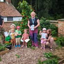 Carl and Kate of Hedera Artistry with Kate Giffen (centre) and Kids Patch children.