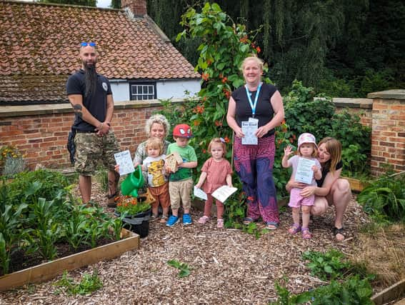 Carl and Kate of Hedera Artistry with Kate Giffen (centre) and Kids Patch children.