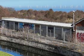 GOING - The beach chalets before the demolition. Photo: Barry Robinson