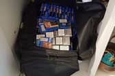 Illegal cigarettes found in a bag under a sink. Photo: Lincs Police
