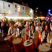 Crowds gather in the Market Place for the Illuminate Festival and Christmas Market.