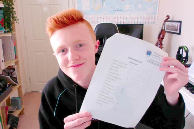 Jack Spinks with his GCSE results