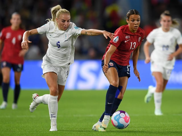 Alex Greenwood battles for possession with Celin Bizet Ildhusoy.